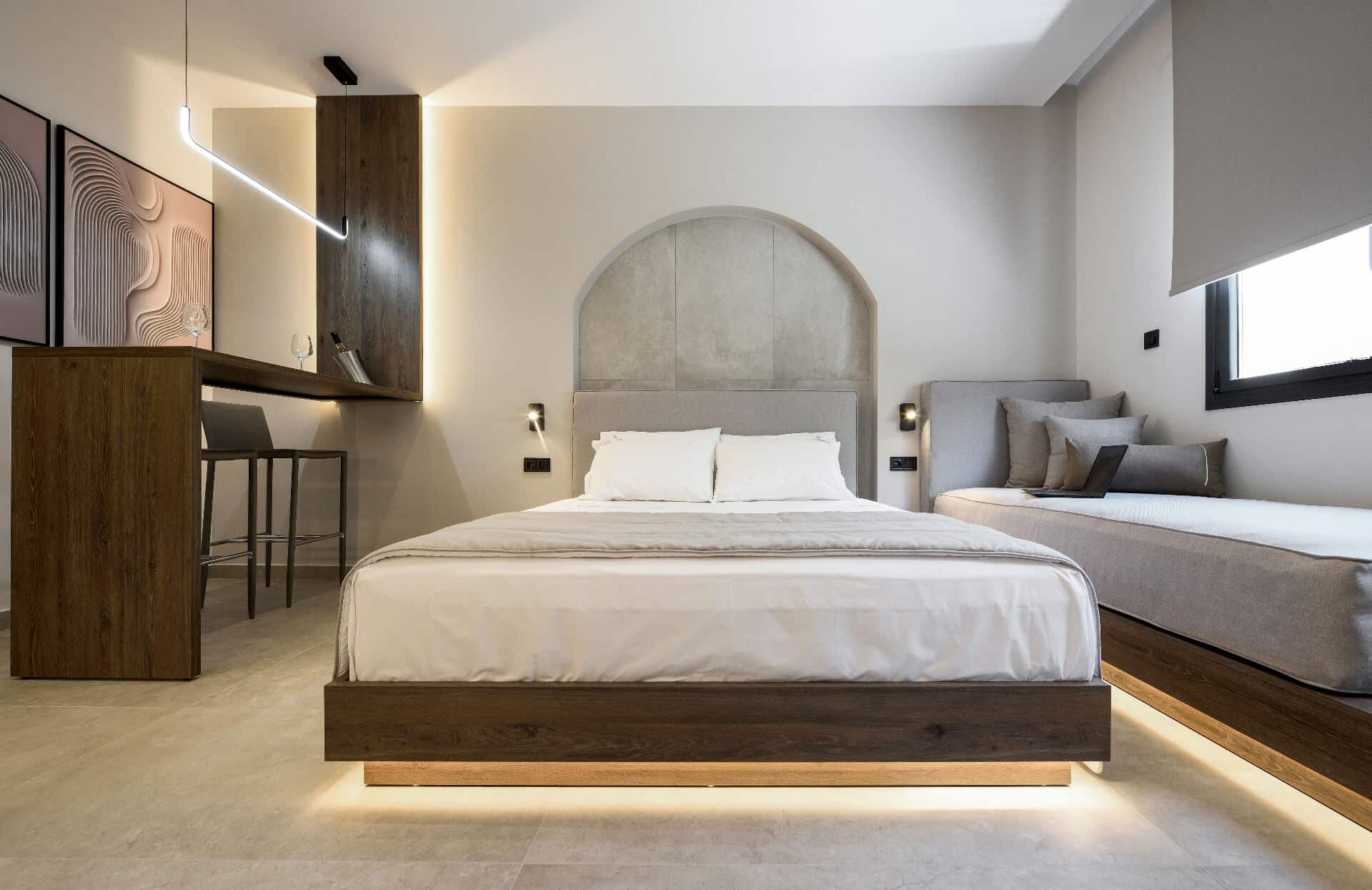 The suite's queen bed and extra single