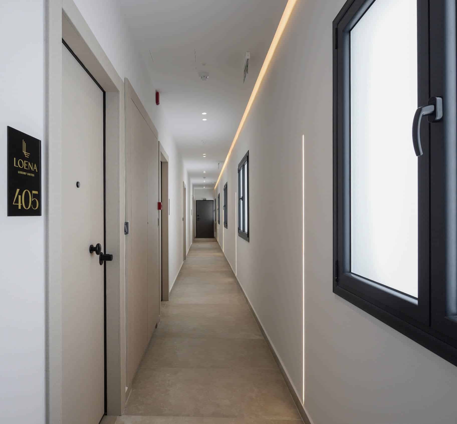 The fourth-floor corridor leading to the door of suite 405