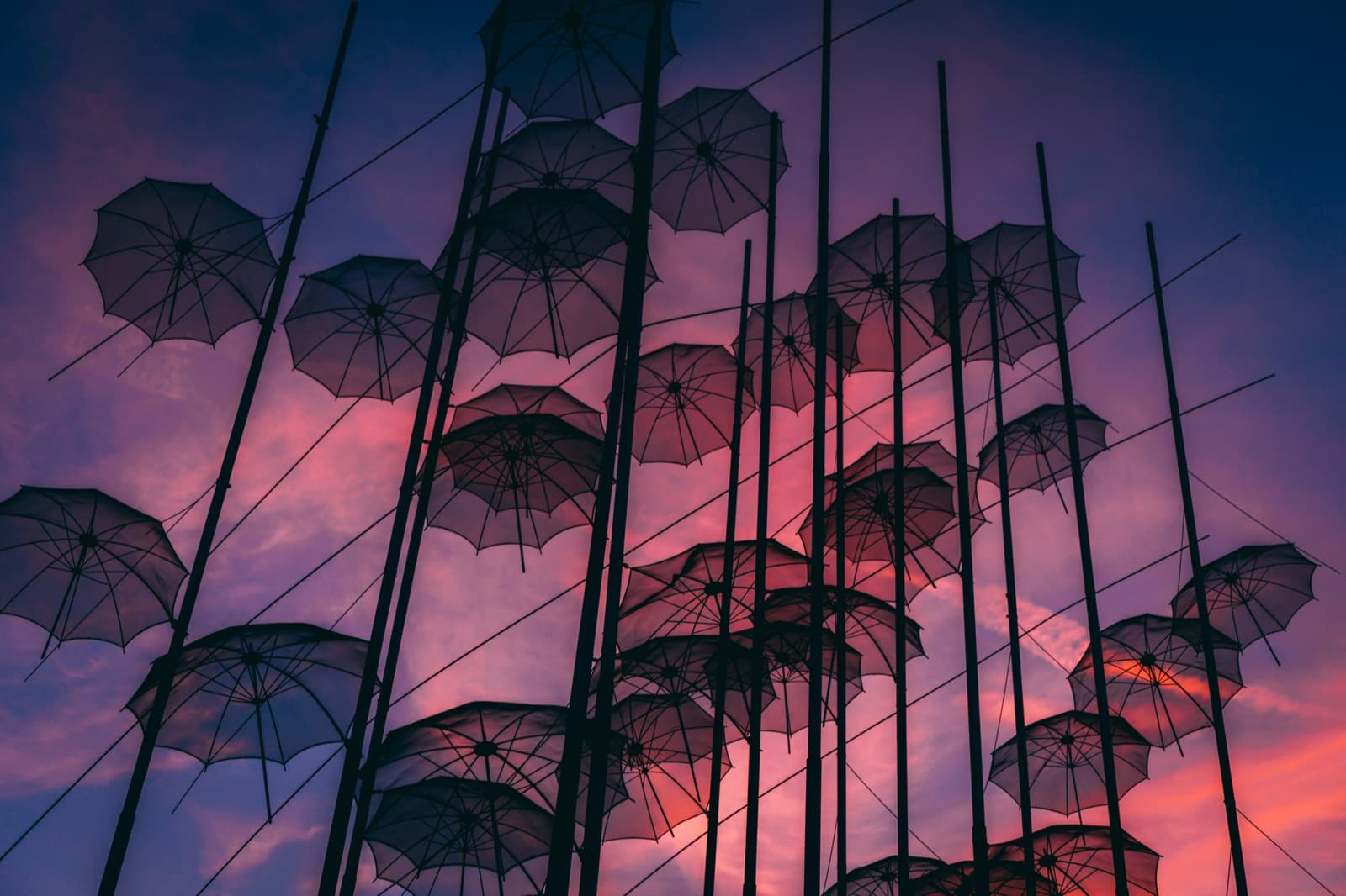 Zongolopoulos's Umbrellas on Nea Paralia at dusk